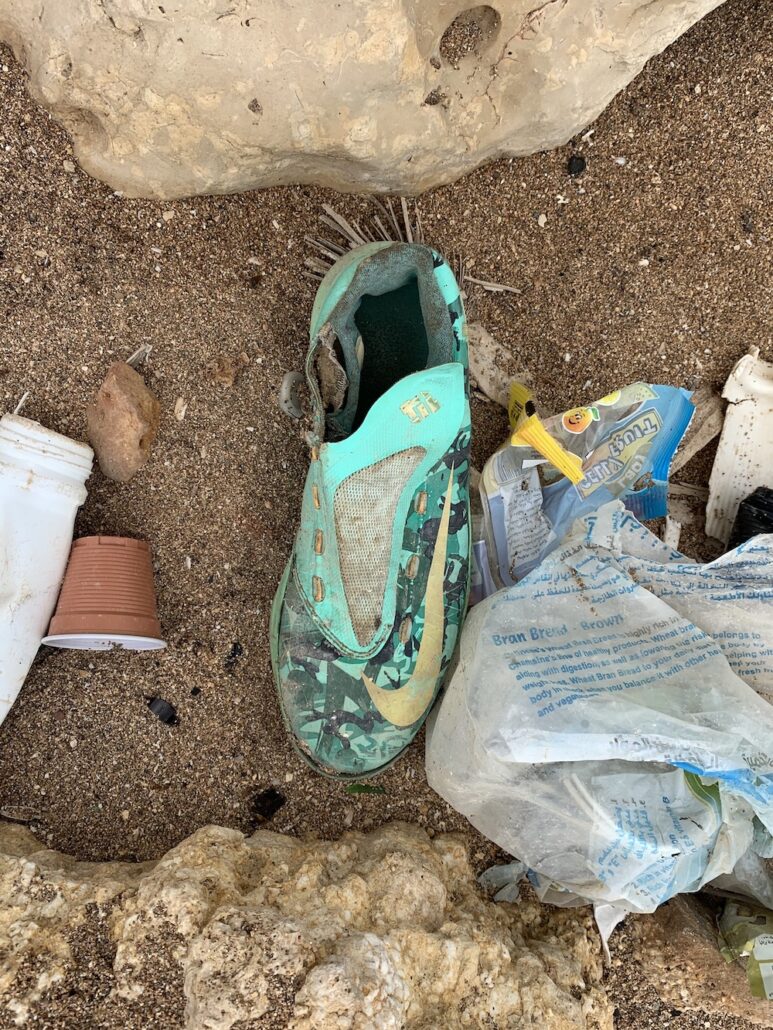 Mahmoud Chatah: green soccer shoe, left
